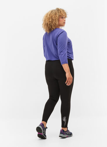 Zizzi Sports tights with reflective details and side pocket, Black, Model image number 1