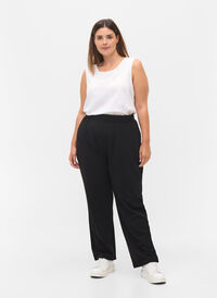 Loose trousers with elasticated waist, Black, Model