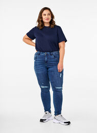 Bardzo waskie jeansy Amy z przetarciami, Blue Denim, Model