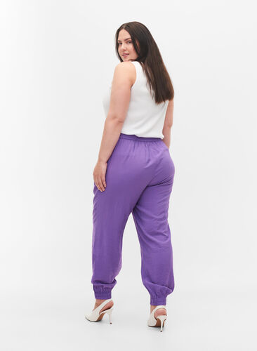 Zizzi Loose viscose blend trousers with elastic trim, Royal Lilac, Model image number 1