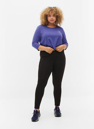 Zizzi Sports tights with reflective details and side pocket, Black, Model image number 0